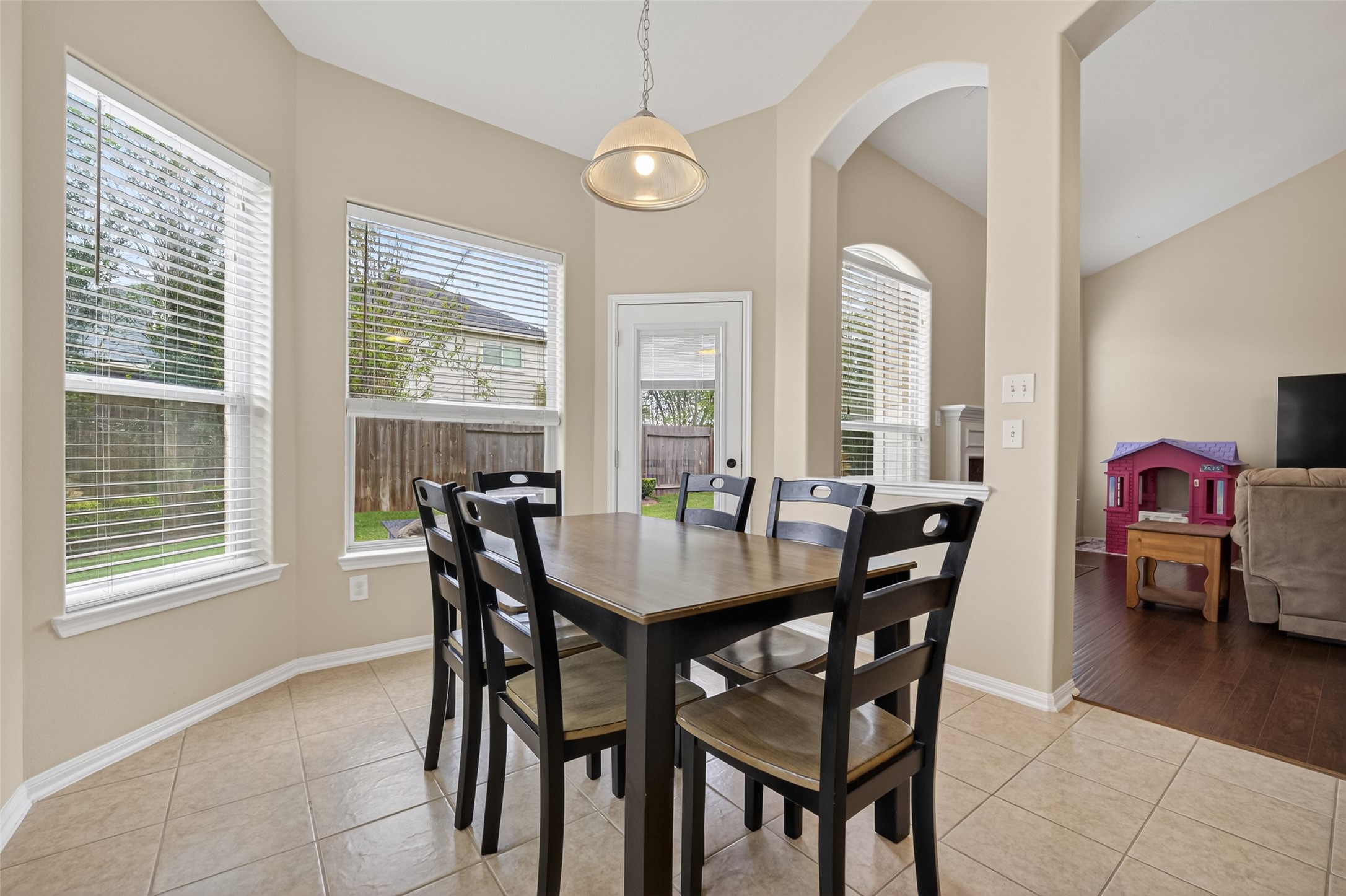 3219 Legends Mist Drive Spring, TX 77386 - Photo 5 of 37 a view of a dining room with furniture and a window