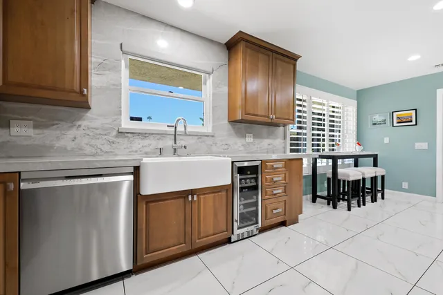 a view of an outdoor sitting area with furniture