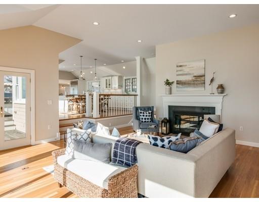50 Mussell Point Road Gloucester, MA 01930 - Photo 12 of 30 a living room with furniture and a fireplace