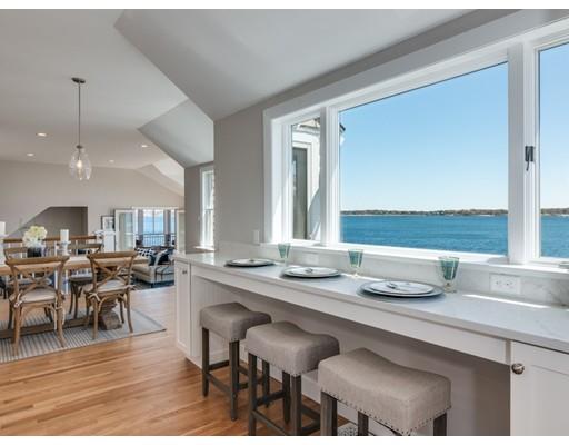 50 Mussell Point Road Gloucester, MA 01930 - Photo 7 of 30 a view of a dining room with furniture and wooden floor