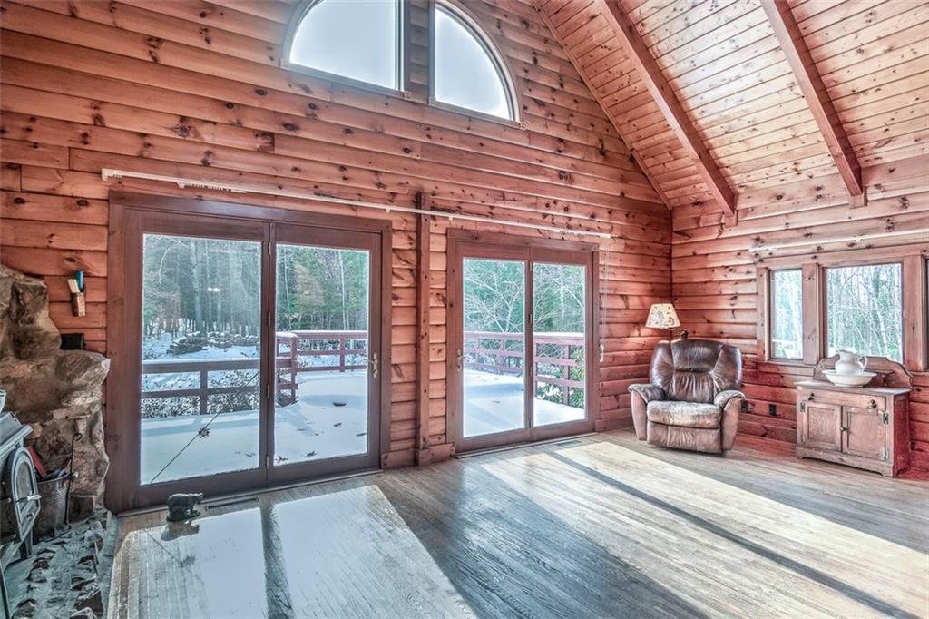 576 Brighton Hill Road Minot, ME 04258 - Photo 11 of 34 Living room with double sliders,...