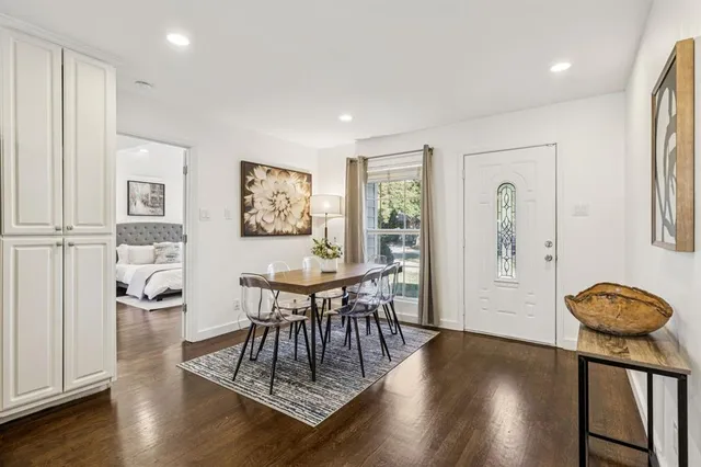 a view of a livingroom with furniture and wooden floor