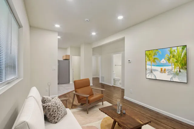 a workspace with furniture and window