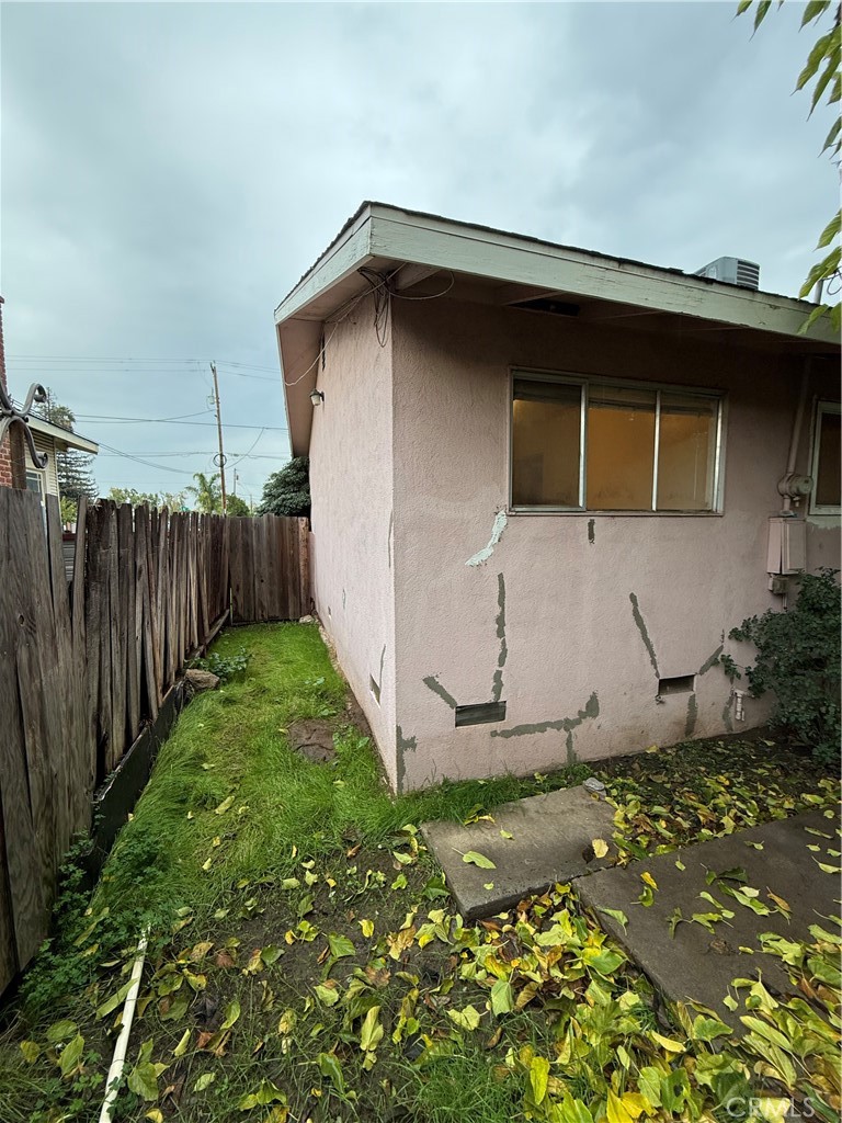 1616 East 21st Street Merced, CA 95340 - Photo 16 of 22 a view of backyard of house with wooden fence