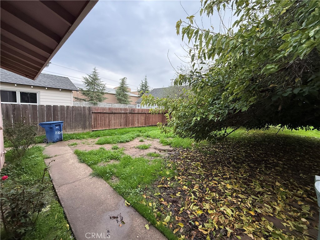 1616 East 21st Street Merced, CA 95340 - Photo 17 of 22 a view of a backyard with a garden