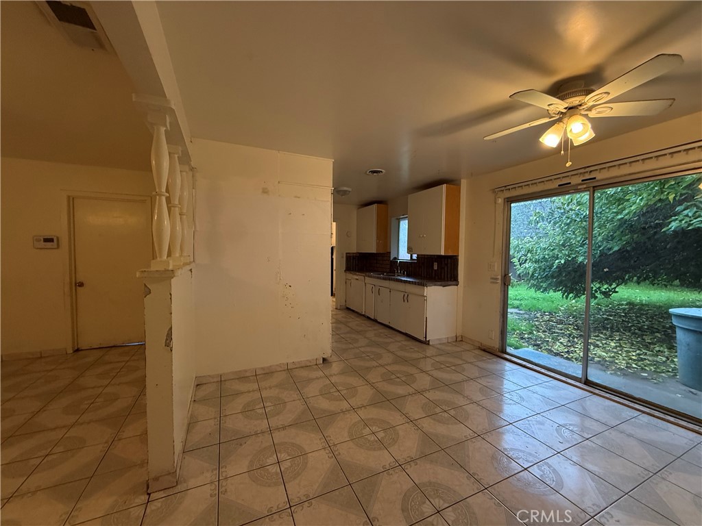 1616 East 21st Street Merced, CA 95340 - Photo 5 of 22 a view of a kitchen with a sink and a window