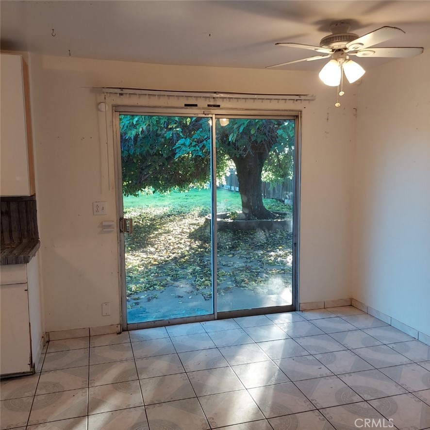 1616 East 21st Street Merced, CA 95340 - Photo 6 of 22 a view of a room with a flat screen tv