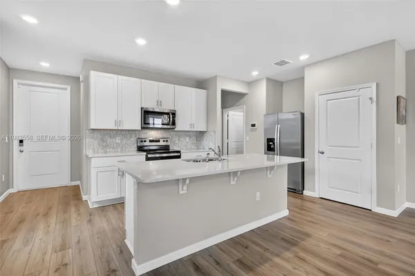 $445,000 | 5610 Southeast Edgewater Circle, Stuart, FL 34997