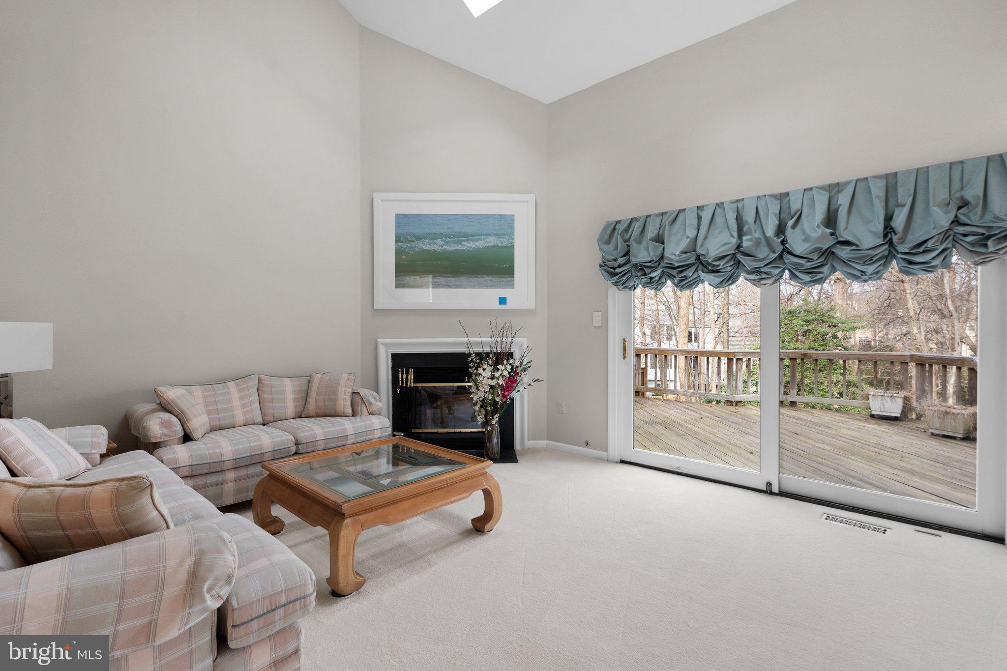 Living room w walkout to deck