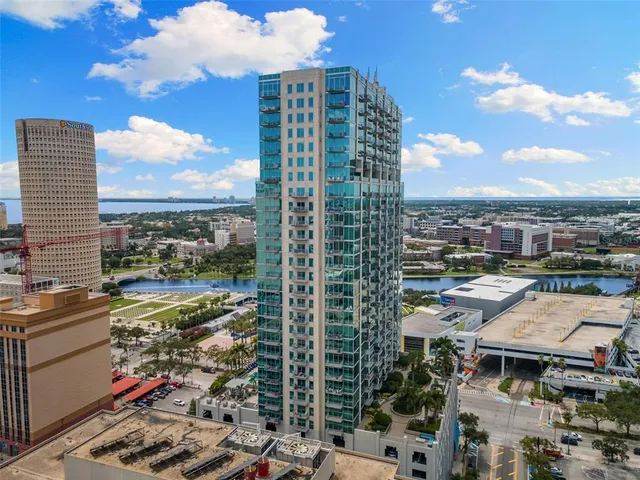 a view of a city with tall buildings