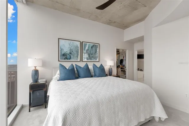 a kitchen with stainless steel appliances a stove refrigerator sink and cabinets