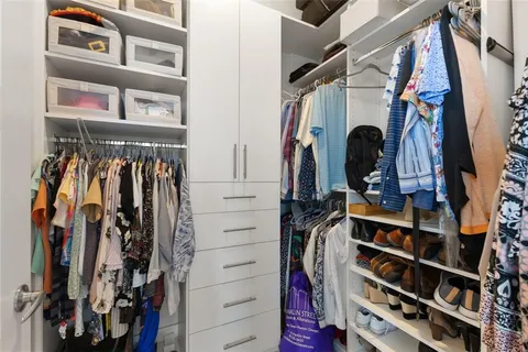 a kitchen with stainless steel appliances granite countertop a sink and a granite counter tops