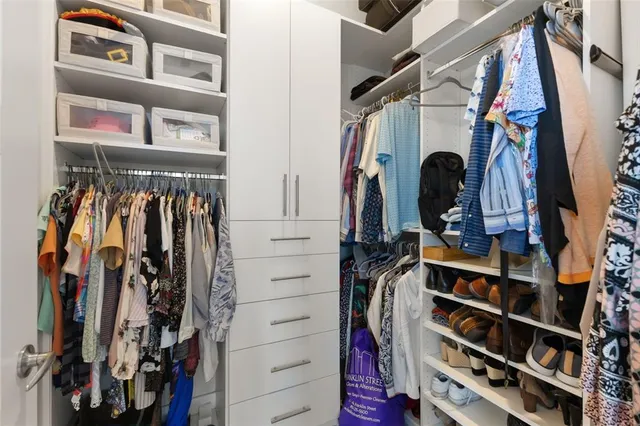 a kitchen with stainless steel appliances granite countertop a sink and a granite counter tops