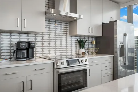 a bathroom with a sink vanity and a mirror