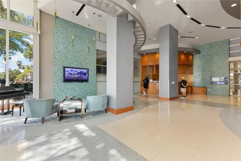 a view of hallway with wooden floor
