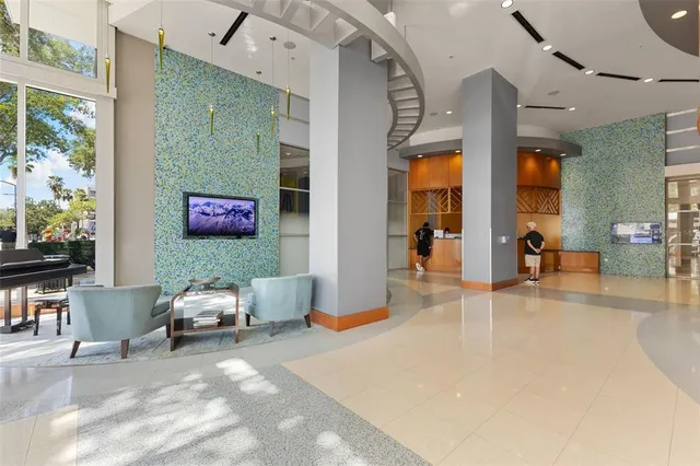 a view of hallway with wooden floor