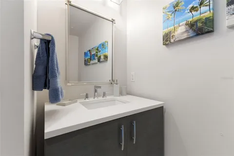 a lobby with furniture and floor to ceiling windows