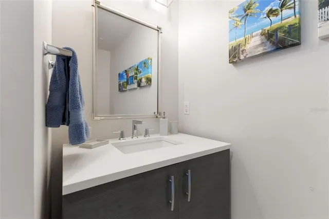 a lobby with furniture and floor to ceiling windows