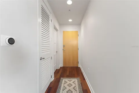 a view of a dining room that has a dining table and chairs