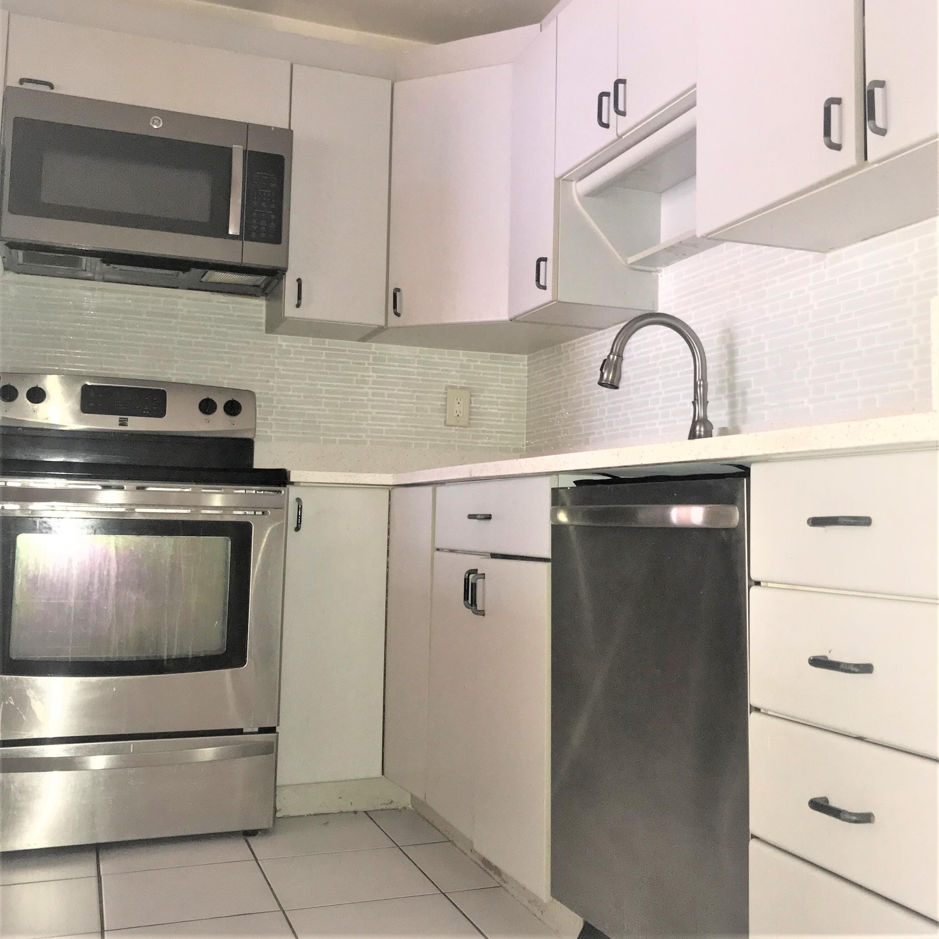 9355 Southwest 8th Street, Unit 325 Boca Raton, FL 33428 - Photo 4 of 112 kitchen four