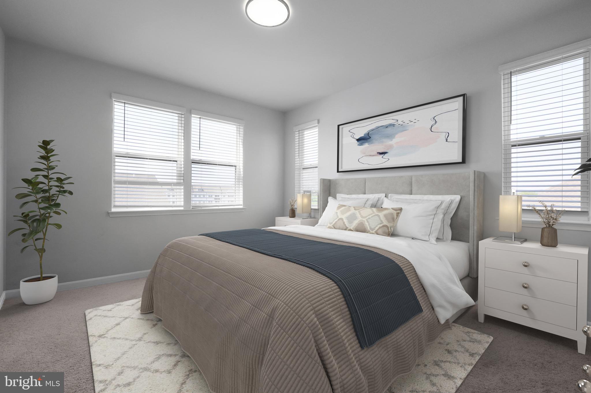 854 Amity Street Frederick, MD 21701 - Photo 21 of 62 a bedroom with a bed and a window