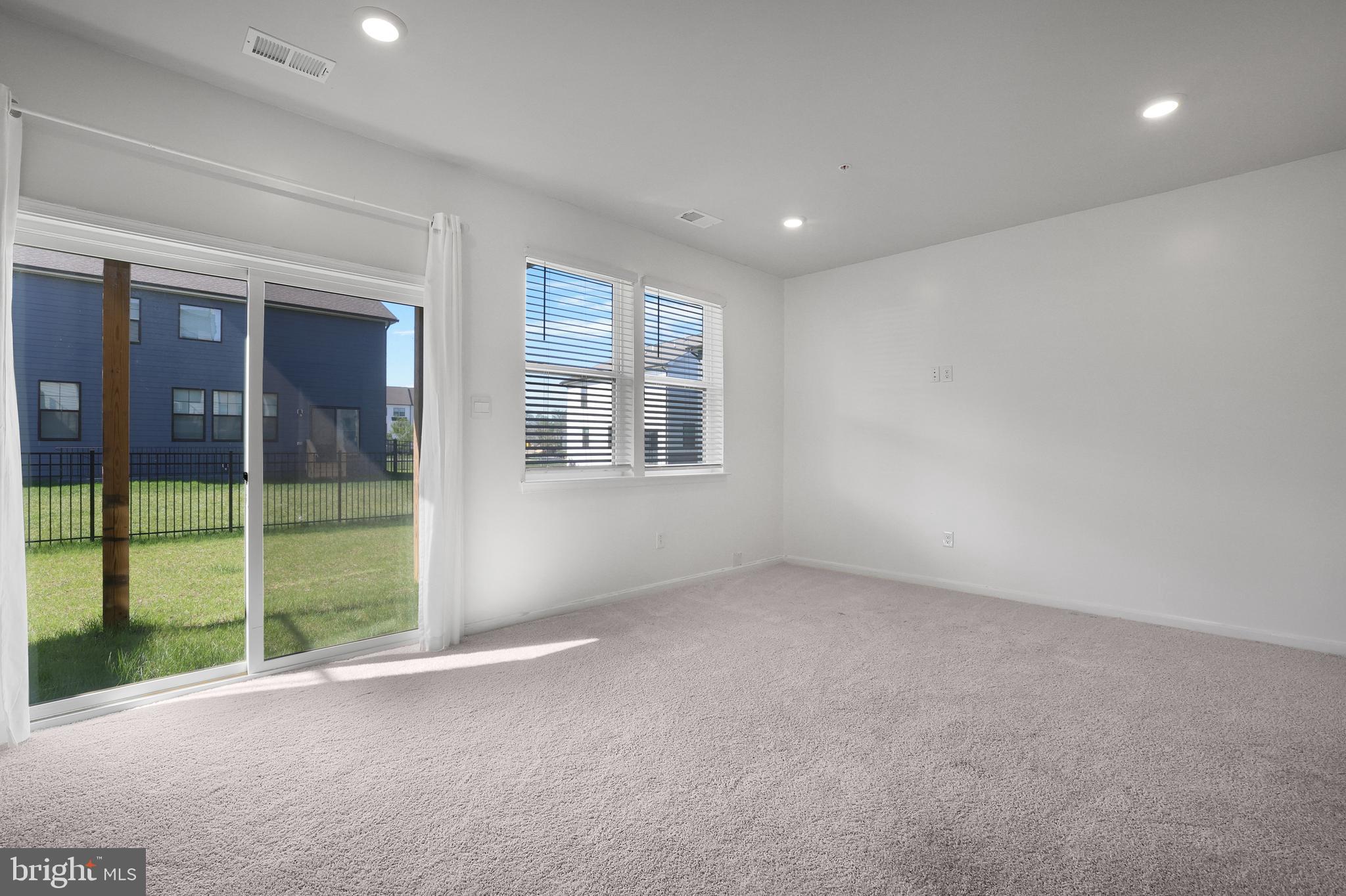 854 Amity Street Frederick, MD 21701 - Photo 37 of 62 a view of an empty room with a window