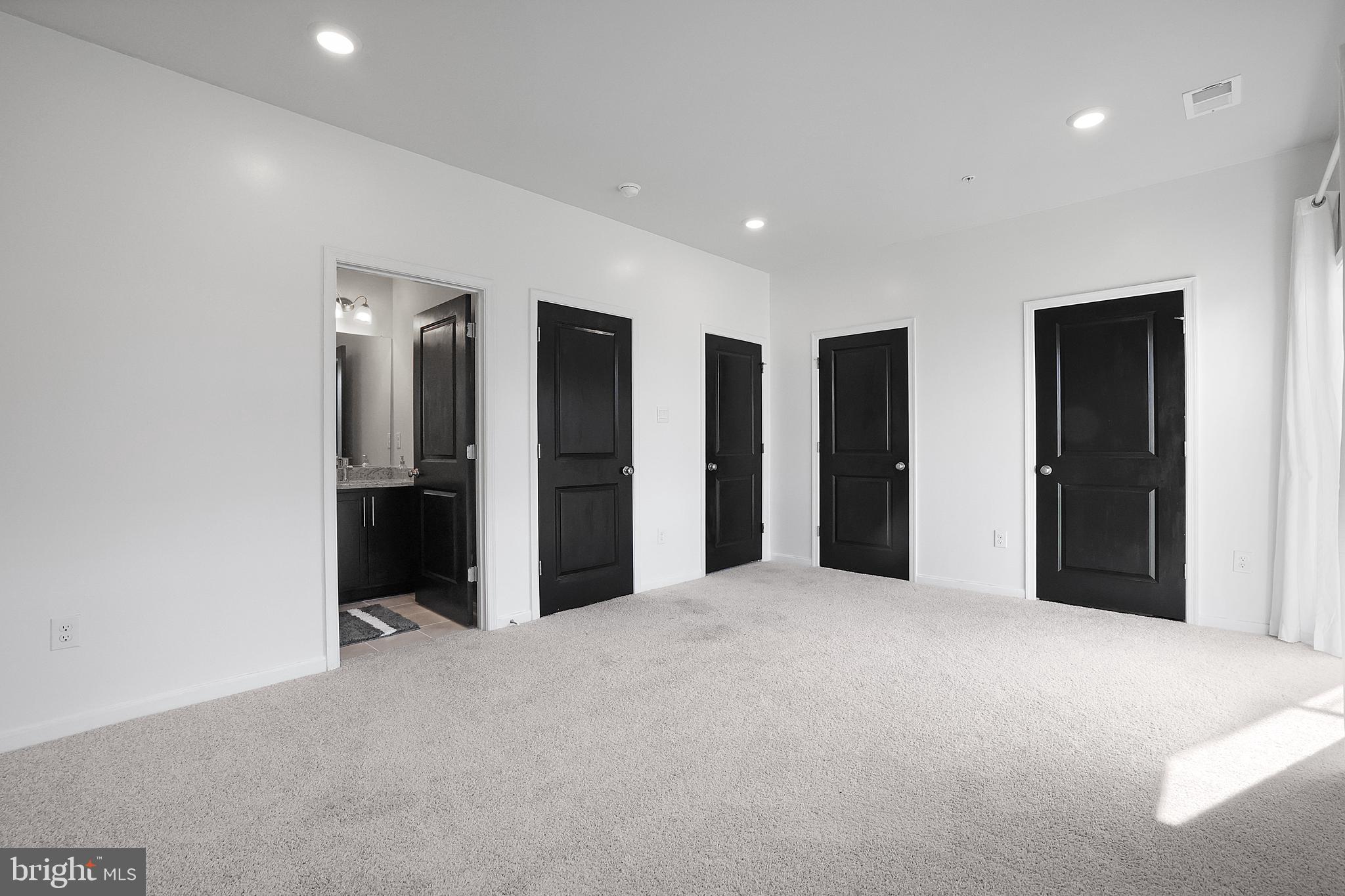854 Amity Street Frederick, MD 21701 - Photo 39 of 62 a view of empty room with floor to ceiling window