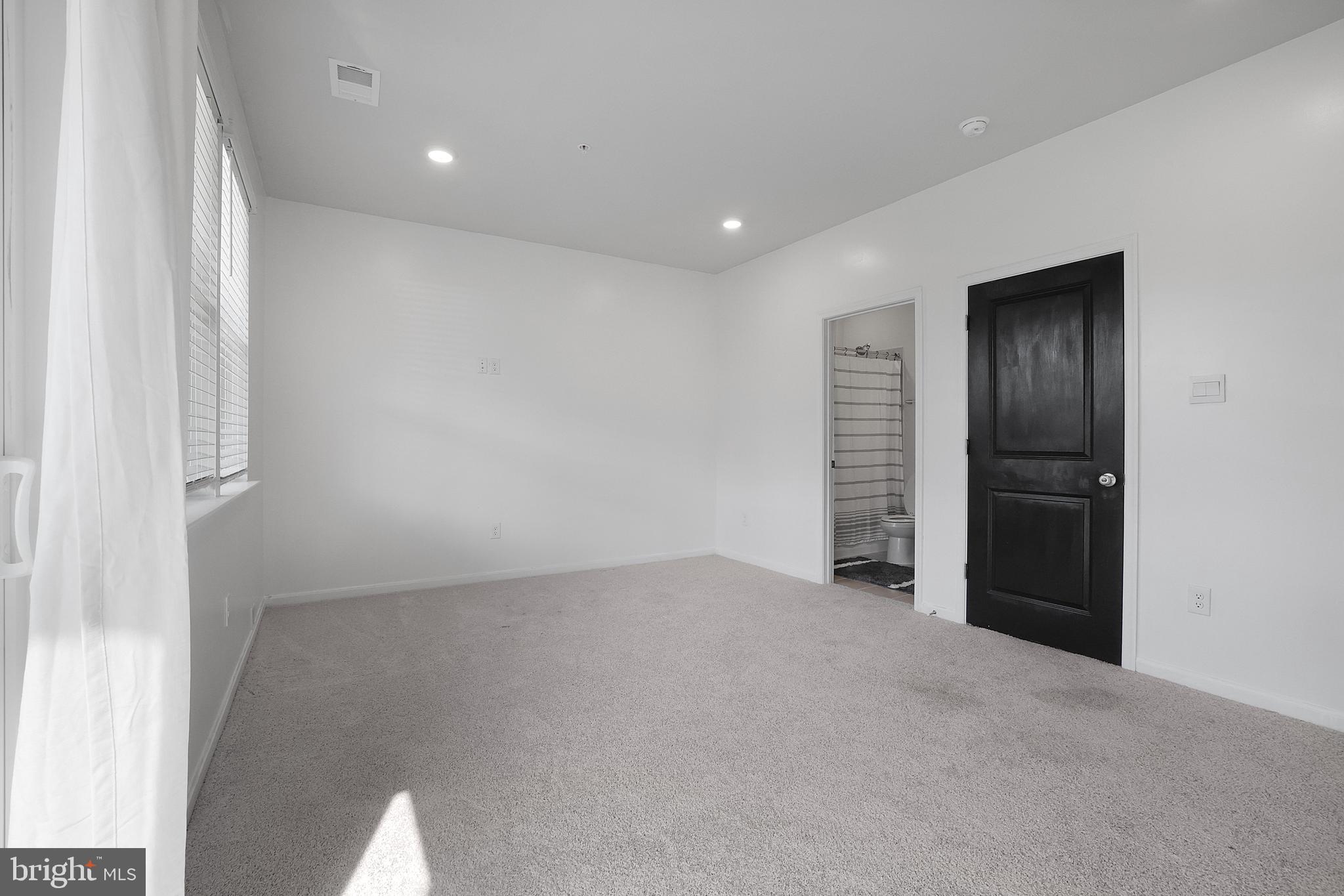 854 Amity Street Frederick, MD 21701 - Photo 40 of 62 a view of an empty room with closet and entryway