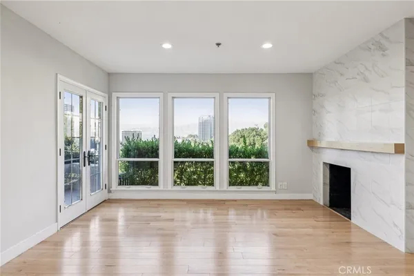 a kitchen with granite countertop a sink and a window