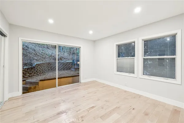 a view of an empty room and window