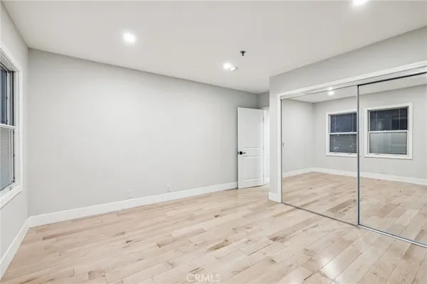 a view of a glass door and a window