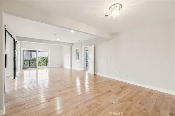 a bathroom with a double vanity sink toilet and a mirror