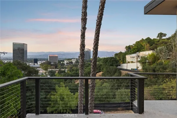 a front view of a house with garage