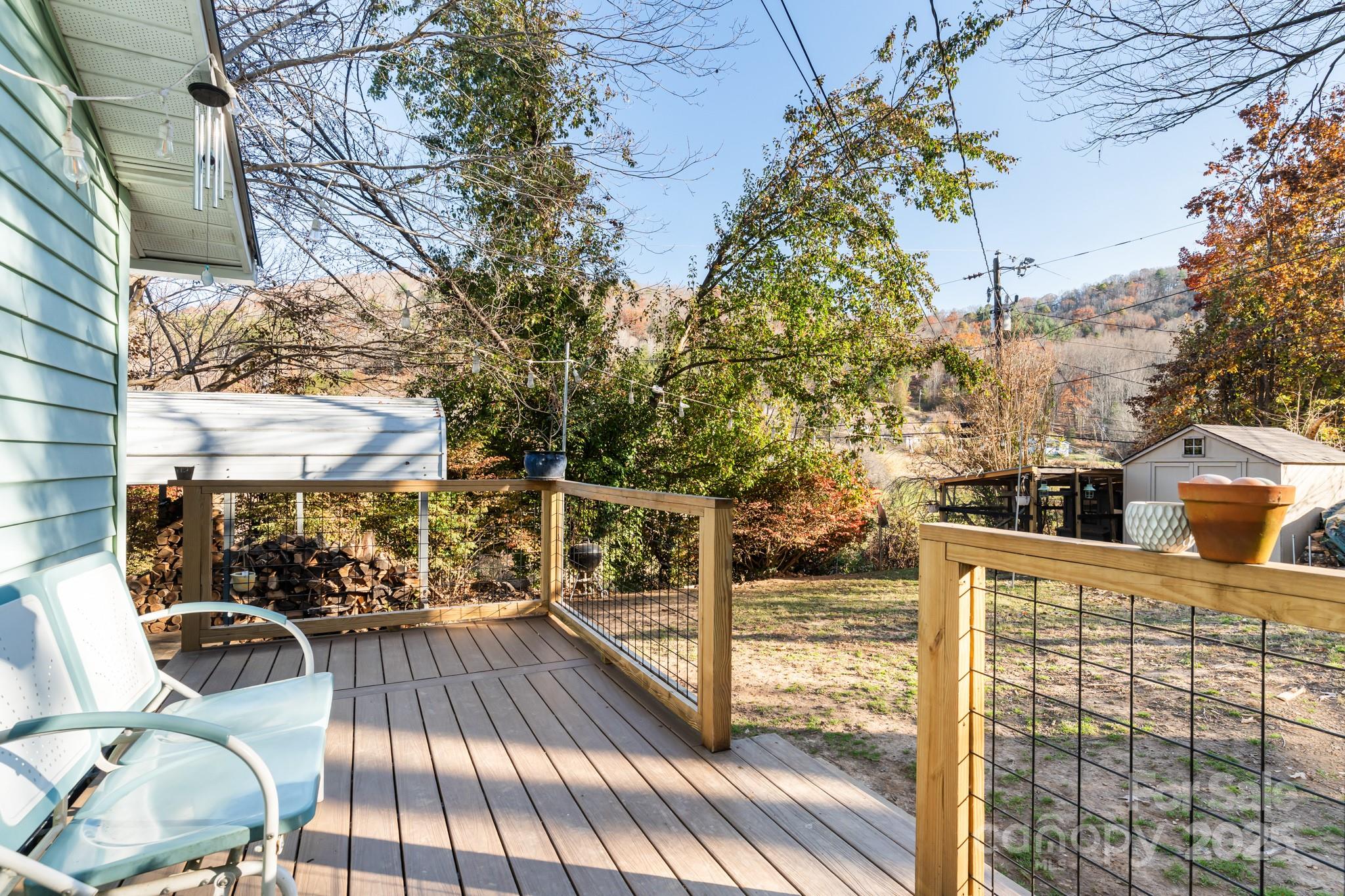14 Sluder Branch Road Candler, NC 28715 - Photo 18 of 21 a view of balcony with chairs