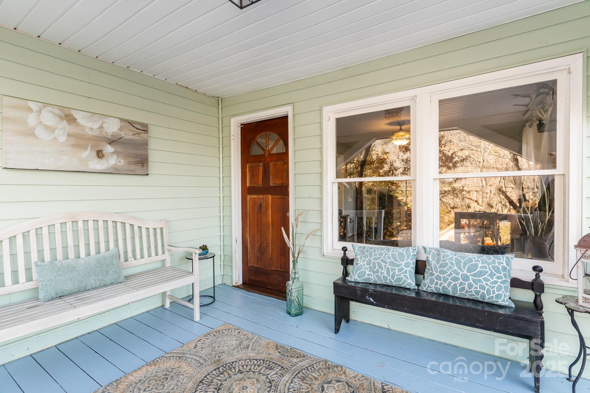 14 Sluder Branch Road Candler, NC 28715 - Photo 2 of 21 a living room with furniture and a window