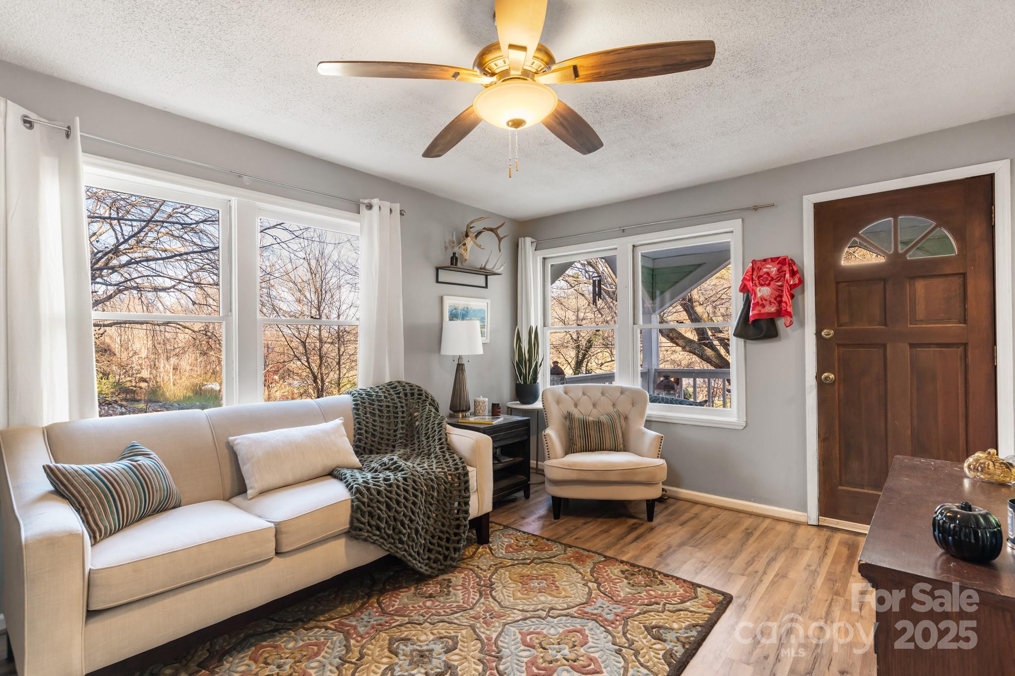 14 Sluder Branch Road Candler, NC 28715 - Photo 6 of 21 a living room with furniture and a window