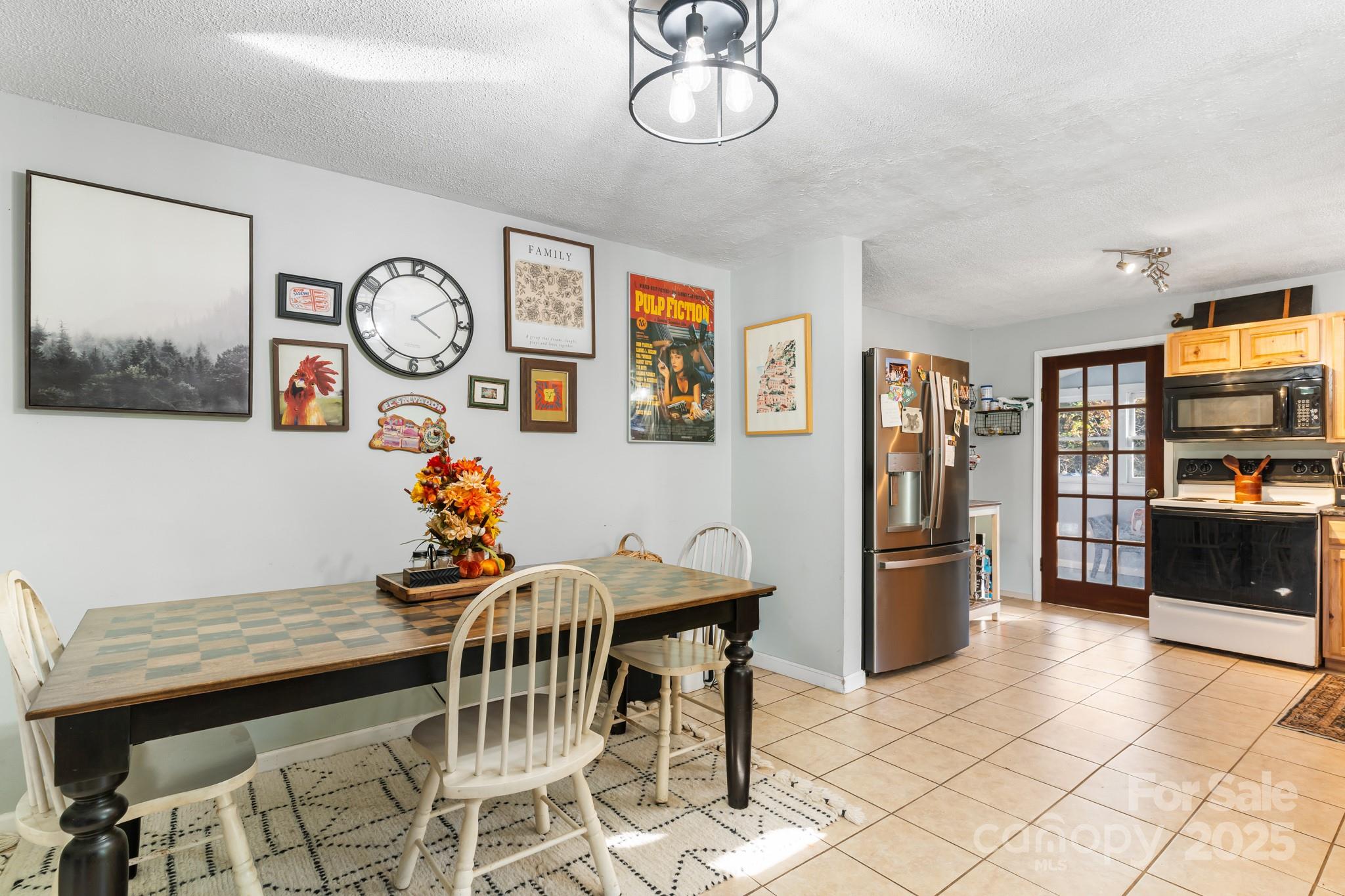 14 Sluder Branch Road Candler, NC 28715 - Photo 9 of 21 a dining room with furniture and window