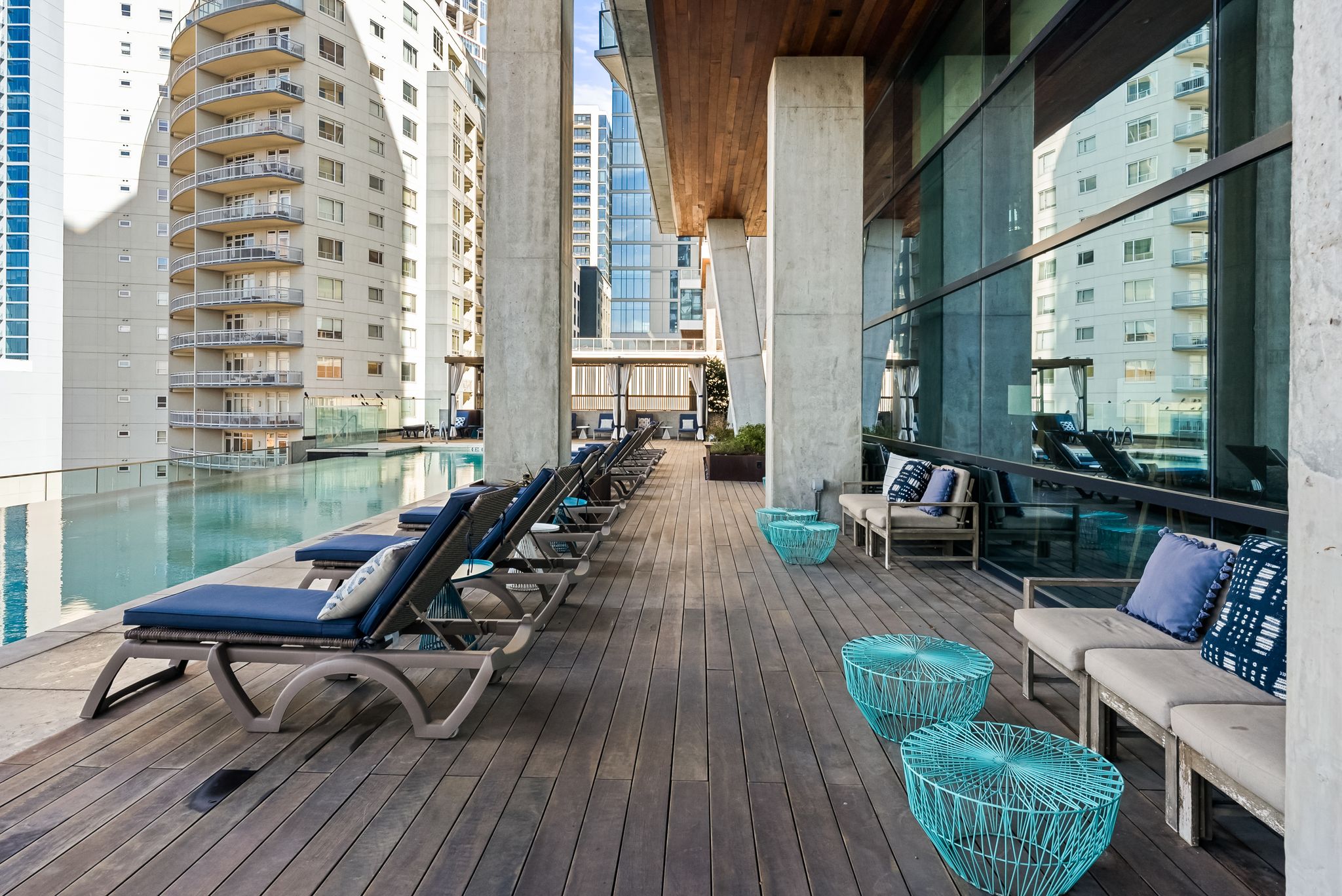 70 Rainey Street, Unit 2606 Austin, TX 78701 - Photo 26 of 37 a view of a balcony with couple of chairs and a potted plant