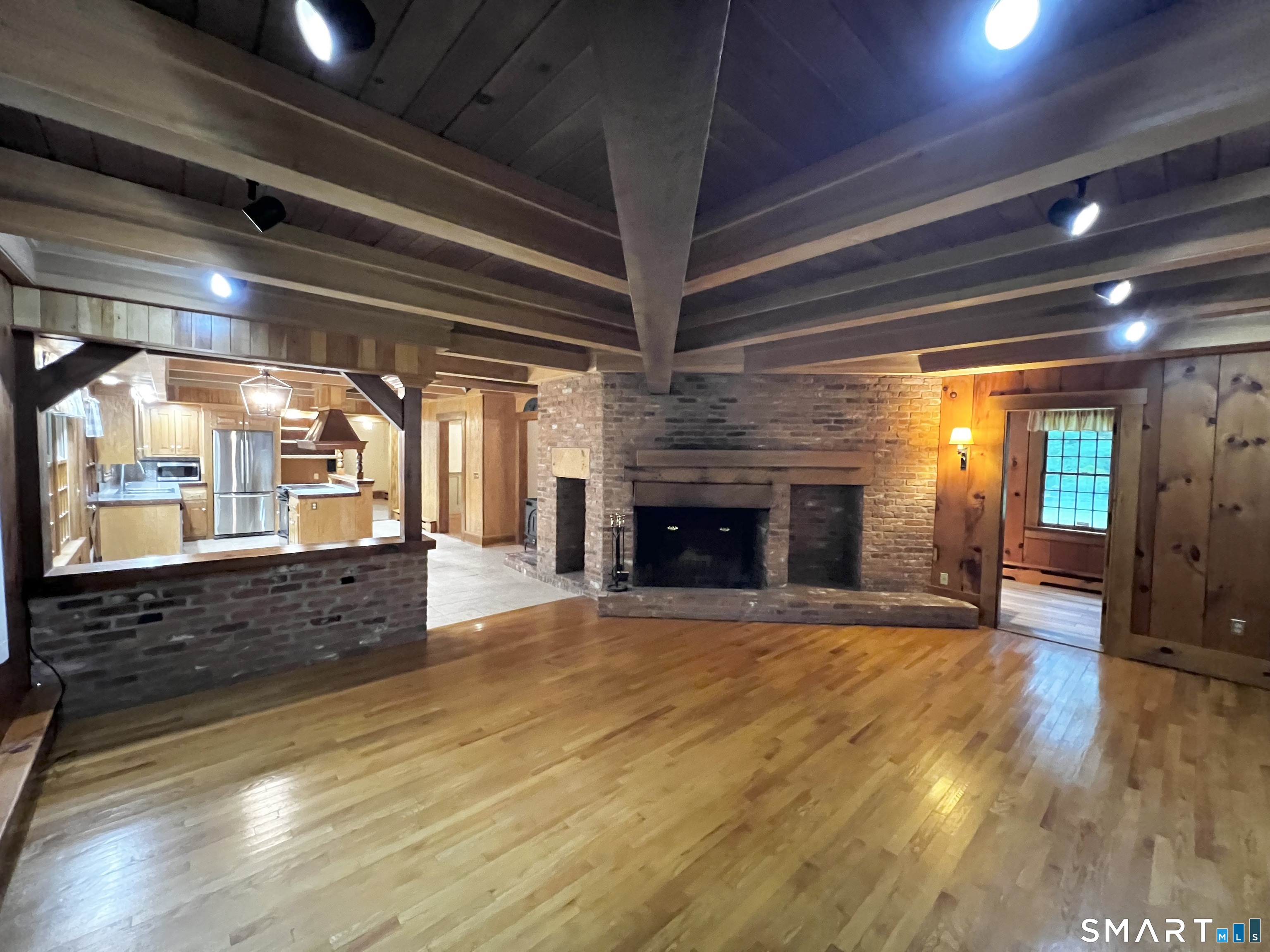 38 Clark Hill Road East Haddam, CT 06423 - Photo 13 of 35 a view of an empty room with wooden floor and a window