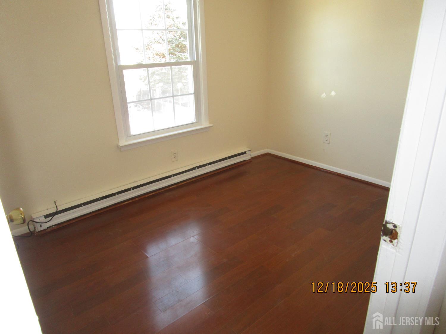 25 Hull Drive Edison, NJ 08817 - Photo 14 of 16 an empty room with a window