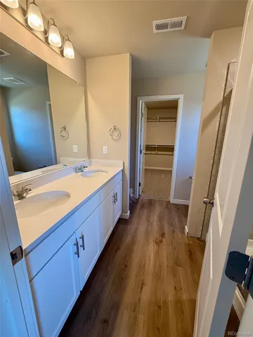a bathroom with a shower and a tub