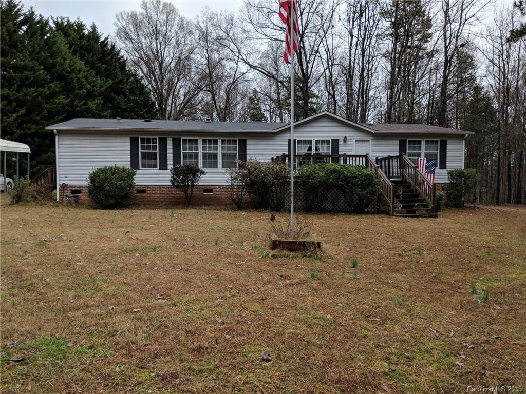 1090 State Rd S-46-1102 York, SC 29745 - Photo 1 of 10 a front view of house with a garden and trees