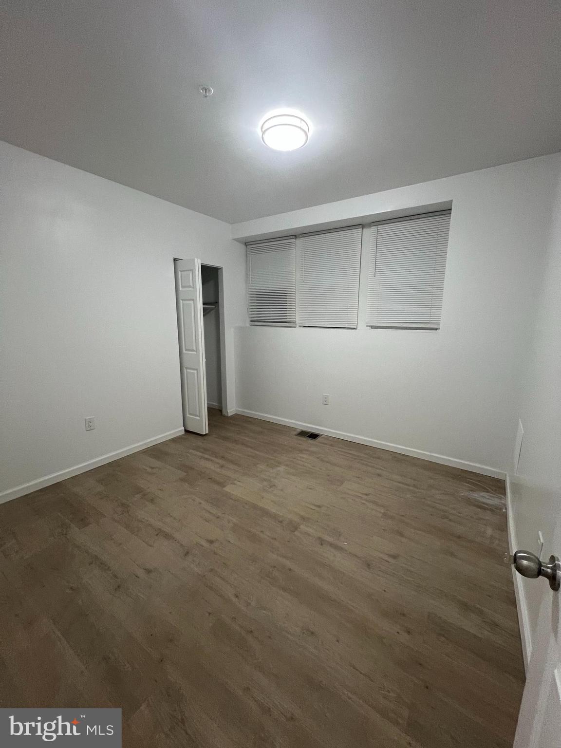 4422 Locust Street, Unit 1 2 Philadelphia, PA 19104 - Photo 8 of 30 an empty room with a empty space and windows