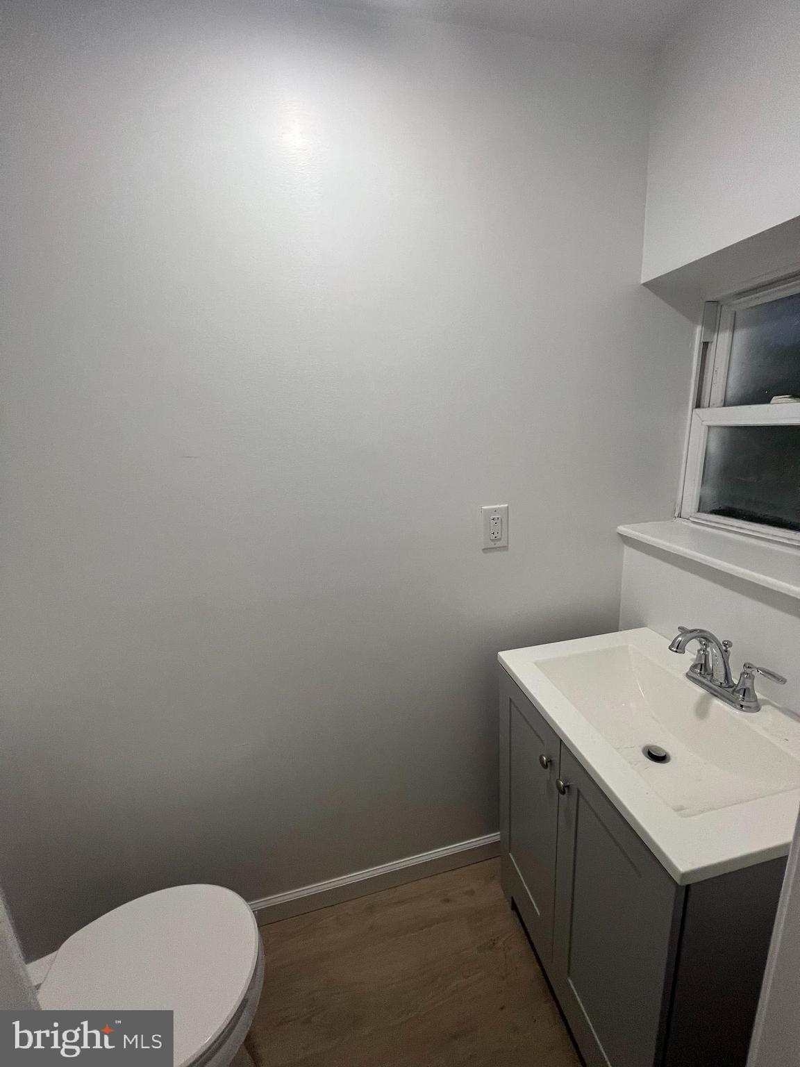 4422 Locust Street, Unit 1 2 Philadelphia, PA 19104 - Photo 10 of 30 a bathroom with a sink toilet and vanity