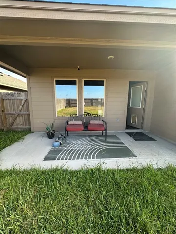 a view of a house with a patio