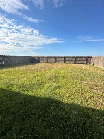 a view of an ocean from a yard