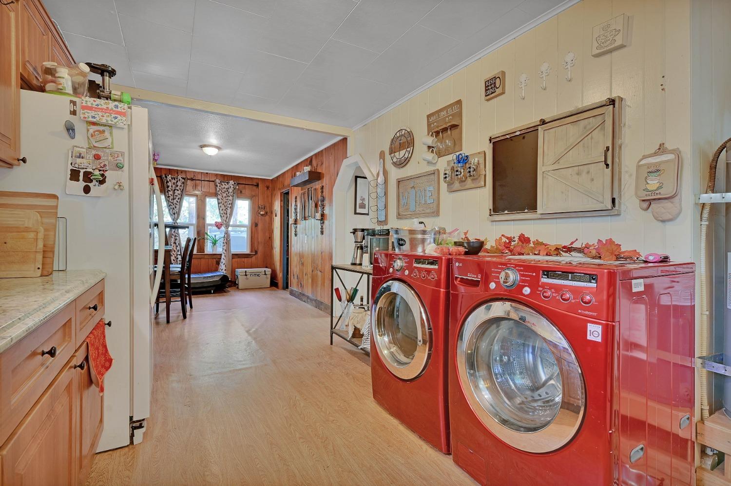 6016 Pony Express Trail Pollock Pines, CA 95726 - Photo 14 of 53 a view of livingroom with washer and dryer
