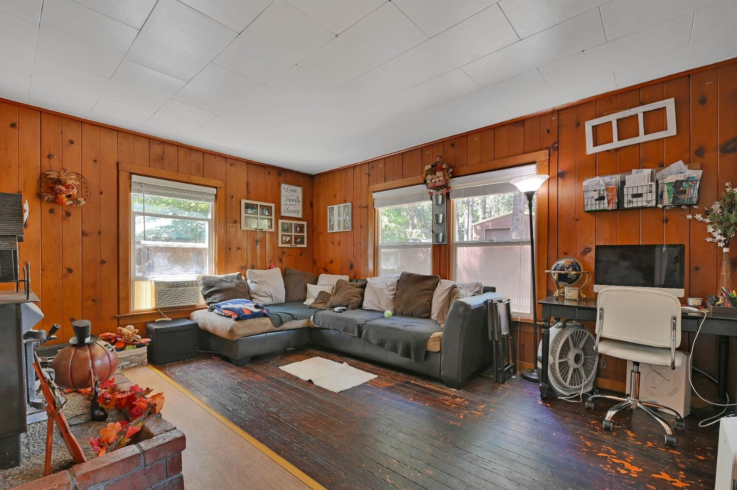 6016 Pony Express Trail Pollock Pines, CA 95726 - Photo 15 of 53 a living room with furniture window and wooden floor