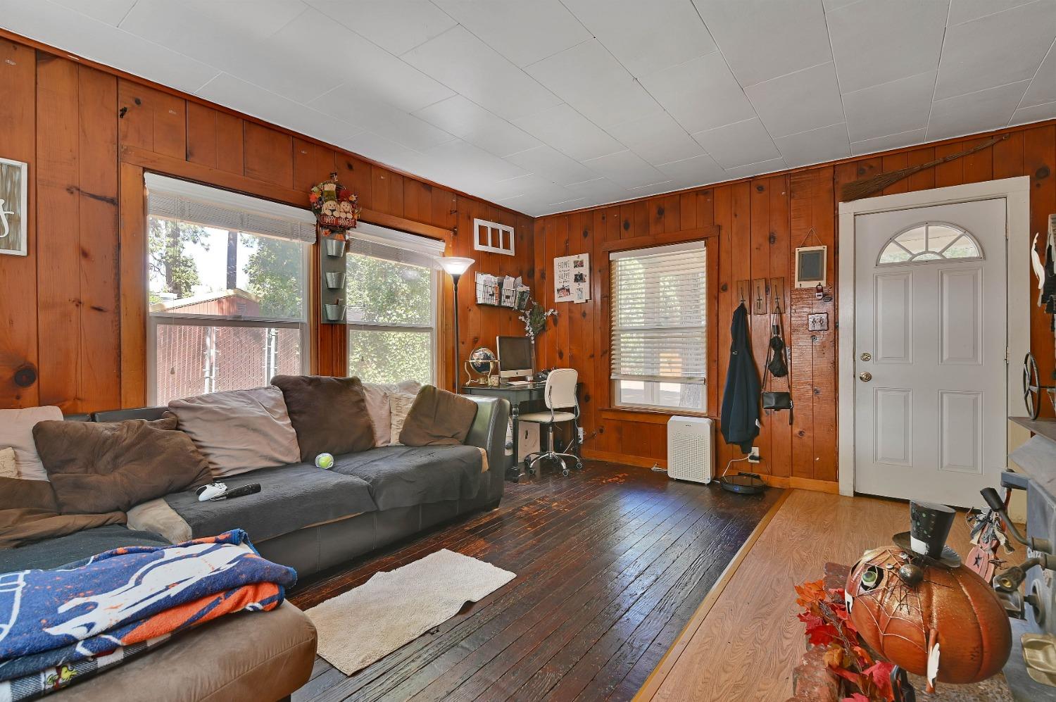 6016 Pony Express Trail Pollock Pines, CA 95726 - Photo 16 of 53 a living room with furniture and a window