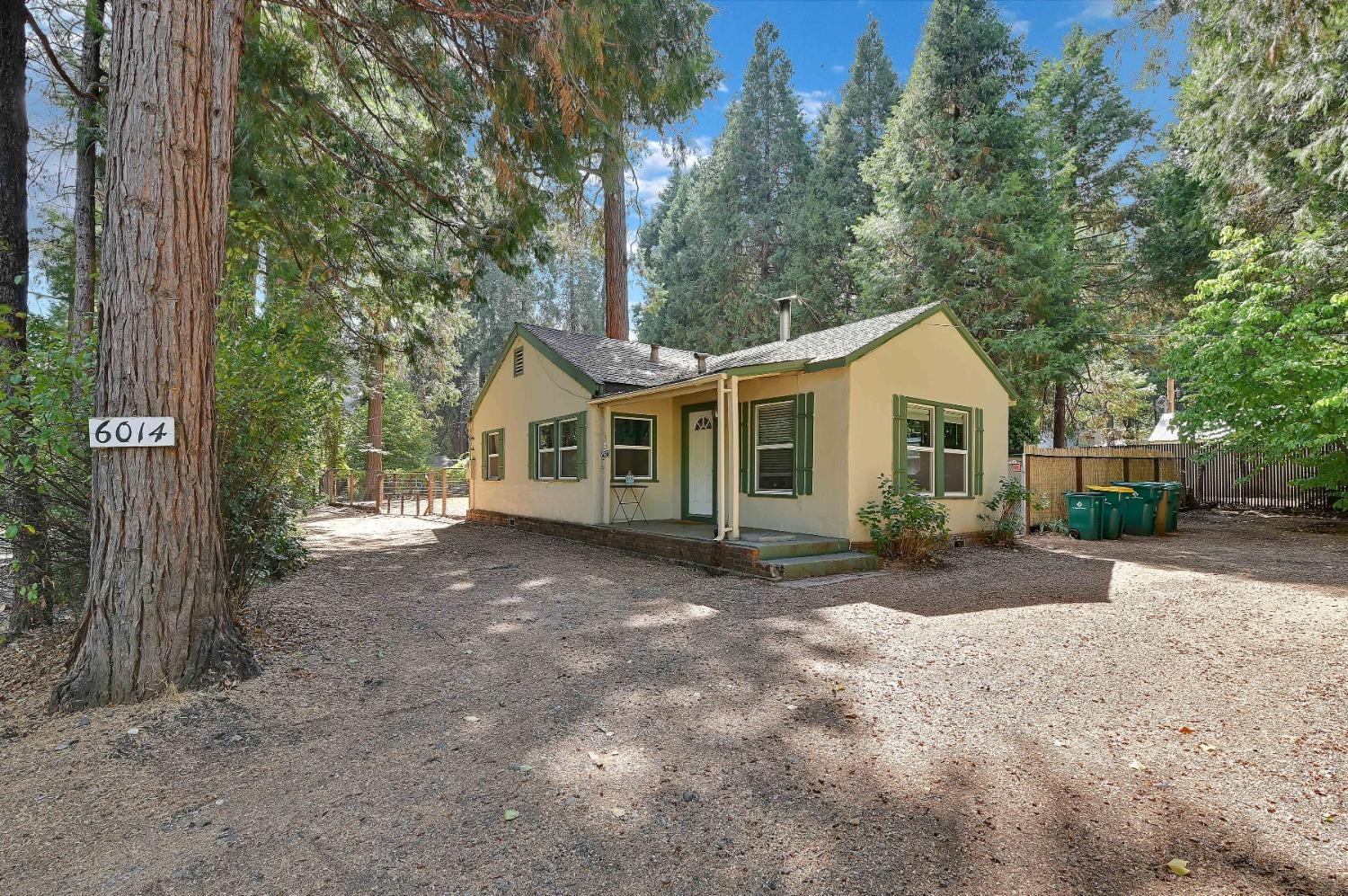 6016 Pony Express Trail Pollock Pines, CA 95726 - Photo 19 of 53 a view of a house with a yard